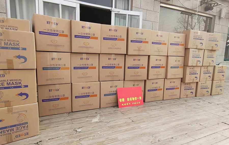 shoulder to shoulder: Donated Masks to Wuhan